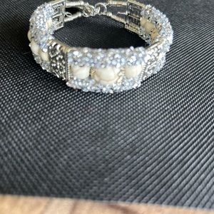 Beautiful ivory like beads with glitter in Silvertone